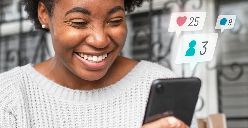 A woman smiling at her phone with like, comment and follower notification icons overlaid.